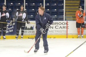Ice head coach Luke Pierce directs practice. - Taylor Rocca Photo